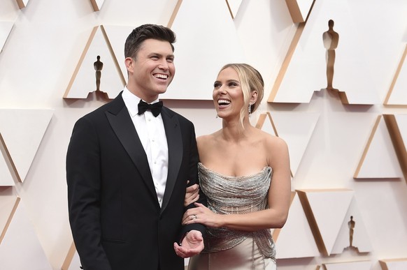 FILE - In this Feb. 9, 2020 file photo, Colin Jost, left, and Scarlett Johansson arrive at the Oscars in Los Angeles. Meals on Wheels America announced Thursday on Instagram that Johansson and Jost ma ...