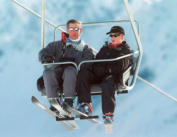 KLOSTERS, SWITZERLAND - JANUARY 5: Charles, Prince of Wales, and Prince Harry, on a Skiing holiday on January 5, 1999 in Klosters, Switzerland. (Photo by Julian Parker/UK Press via Getty Images)