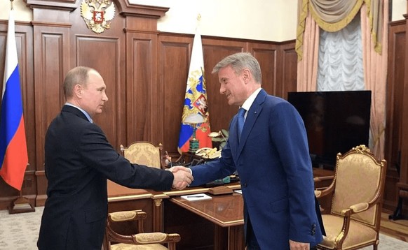Vladimir Poutine et German Gref lors d'une réunion au Kremlin en février 2017.
