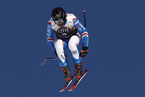France&#039;s Cyprien Sarrazin speeds down the course during an alpine ski, men&#039;s World Cup downhill race, in Wengen, Switzerland, Saturday, Jan. 13, 2024. (AP Photo/Gabriele Facciotti)