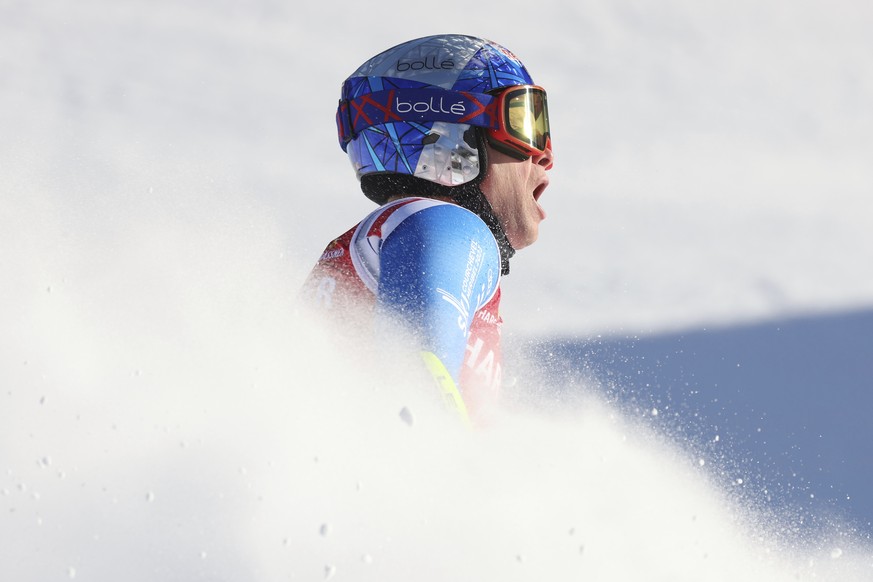 France&#039;s Alexis Pinturault reacts after crossing the finish line to complete an alpine ski, men&#039;s World Cup giant slalom, in Alta Badia, Italy, Sunday, Dec. 18, 2022. (AP Photo/Alessandro Tr ...