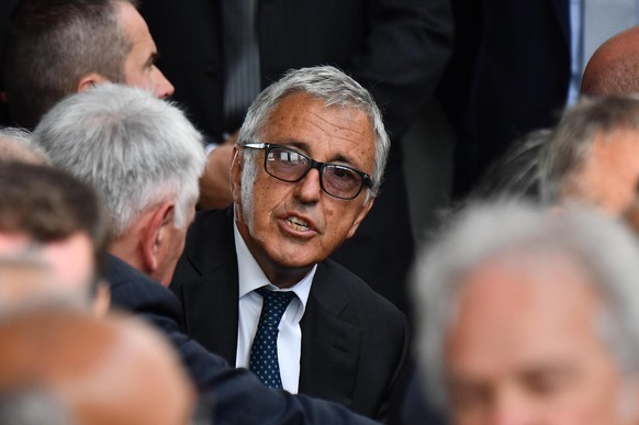 epa07772452 Atlantia CEO Giovanni Castellucci arrives to attend the official ceremony on the first anniversary of the Morandi highway bridge collapse, in Genoa, northern Italy, 14 August 2019. The mot ...