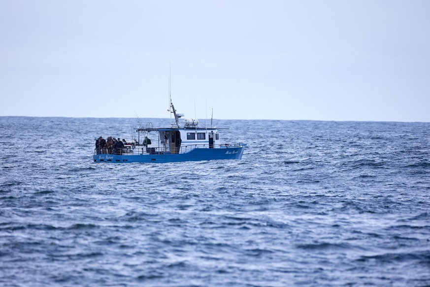 Fishermen fish in the Pacific Ocean near the wave energy test site near Newport, Ore., Friday, Aug. 23, 2024. Private developers will be able to use the site to test devices that they&#039;ve designed ...