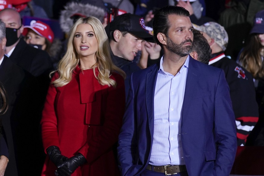 FILE - Ivanka Trump and Donald Trump Jr., listen as President Donald Trump speaks during a campaign rally at Kenosha Regional Airport, Monday, Nov. 2, 2020, in Kenosha, Wis. New York Attorney General  ...