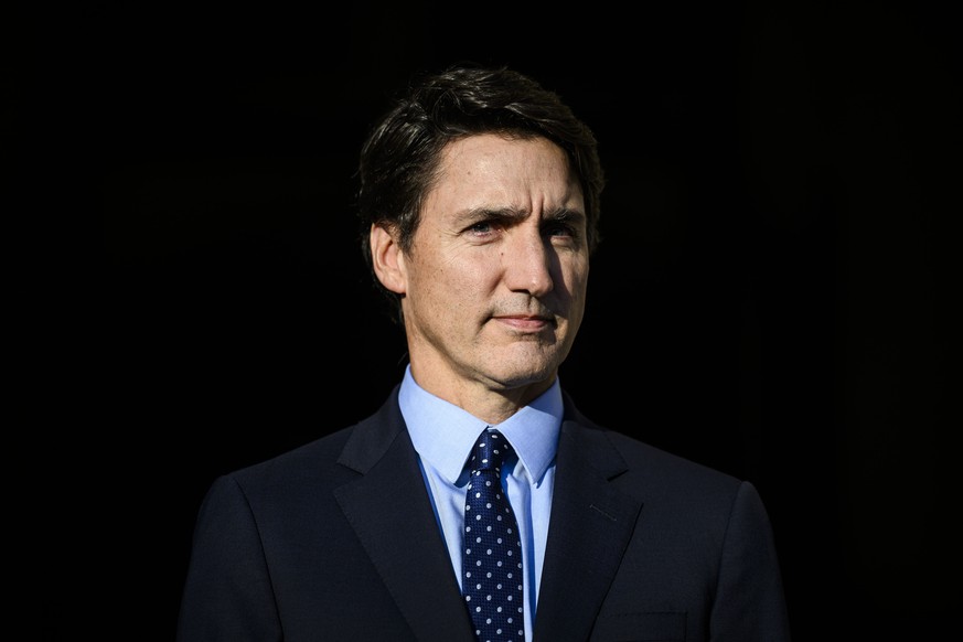 Canada Prime Minister Justin Trudeau waits to greet Sheikh Tamim bin Hamad Al Thani, Emir of Qatar, not shown, before a meeting on Parliament Hill in Ottawa, on Tuesday, Sept. 17, 2024. (Justin Tang/T ...