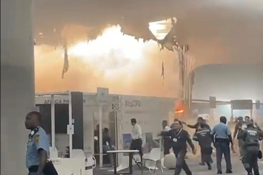 In this frame from video provided by Catherine Ellis, flames engulf pavilions at the COP30 U.N. Climate Summit, Thursday, Nov. 20, 2025, in Belem, Brazil. (Catherine Ellis via AP)
Climate COP30 Fire
