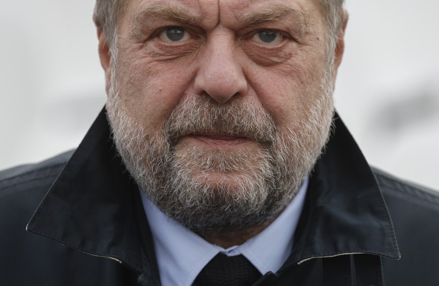 epa10969438 French Justice Minister Eric Dupond-Moretti arrives to attend a ceremony at the Tomb of the Unknown Soldier at the Arc de Triomphe in Paris, France, 11 November 2023, as part of commemorat ...