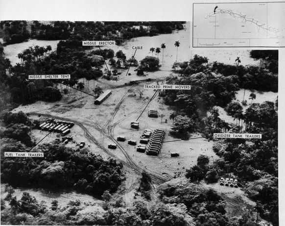 In this photo provided by the Department of Defense, this low level photo, made Oct. 23, 1962, of the medium range ballistic missile site under construction at Cuba&#039;s San Cristobal area. A line o ...