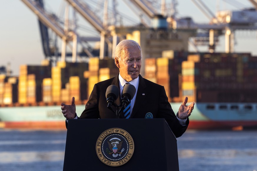 epa09574882 US President Joe Biden touts his recently-passed bipartisan infrastructure bill at the Port of Baltimore in Baltimore, Maryland, USA, 10 November 2021. Lawmakers will continue debate on hi ...