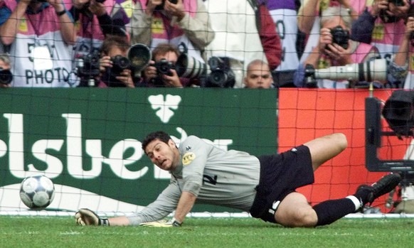 Francesco Toldo of Italy makes the winning save in the penalty shootout during the EURO 2000 Soccer Championship semi final match between Italy and The Netherlands at the ArenA in Amsterdam Thursday J ...