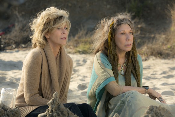 This photo provided by Netflix shows Jane Fonda, left, and Lily Tomlin in the Netflix Original Series &amp;quot;Grace and Frankie,&amp;quot; premiering on Friday. (Melissa Moseley/Netflix via AP)