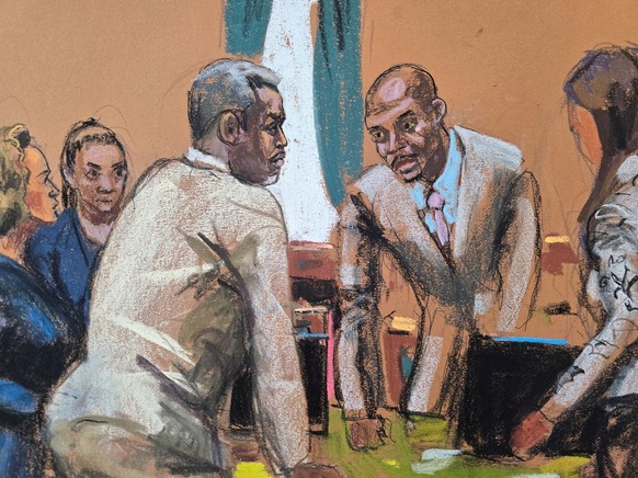 Sean &quot;Diddy&quot; Combs speaks to his lawyers before the start of the day&#039;s proceedings during Combs&#039; sex trafficking trial in New York City, New York, U.S., June 5, 2025 in this courtr ...