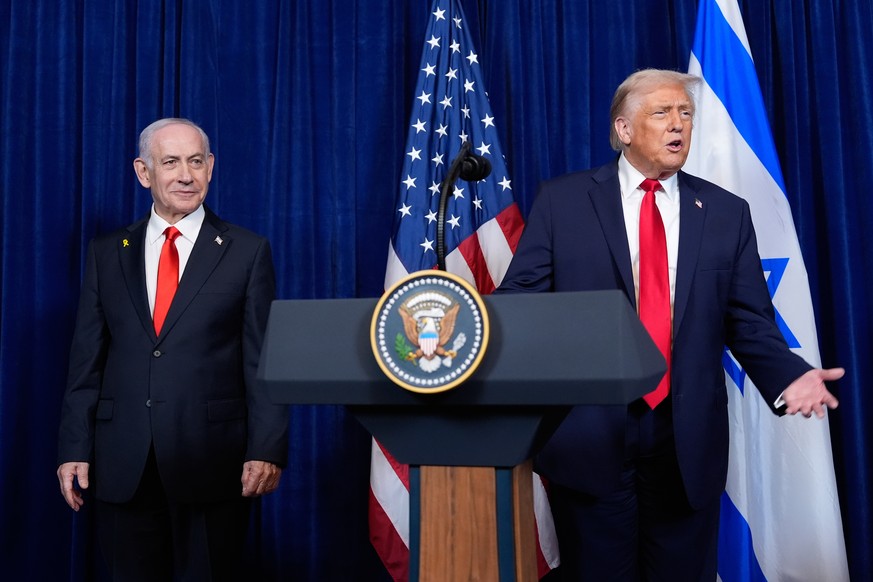 FILE - President Donald Trump answers a question from a reporter at the end of a news conference with Israel's Prime Minister Benjamin Netanyahu at Mar-a-Lago, Dec. 29, 2025, in Palm Beach, Fla.  ...