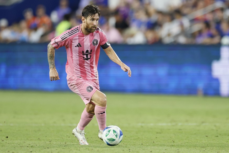 Inter Miami&#039;s Lionel Messi dribbles the ball against FC Cincinnati during the second half of an MLS soccer match Wednesday, July 16, 2025, in Cincinnati. (AP Photo/Jay LaPrete)
Lionel Messi