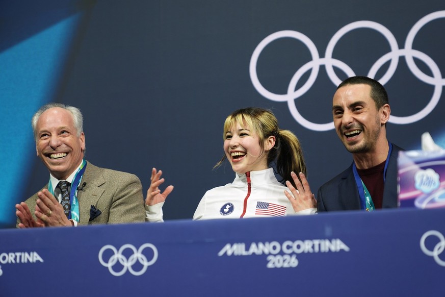 Alysa Liu of the United States reacts to her score after competing in the women's figure skating free program at the 2026 Winter Olympics, in Milan, Italy, Thursday, Feb. 19, 2026. (AP Photo/Step ...