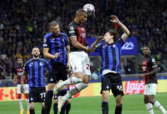 epa10632536 Milan&#039;s Malick Thiaw (C) in action against Inter&#039;s Matteo Darmian (R) during the UEFA Champions League semi-final second leg soccer match between FC Inter and AC Milan, in Milan, ...