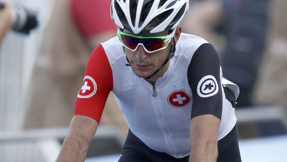 Switzerland&#039;s Sebastien Reichenbach arrives in the finish area during the men&#039;s cycling road race in Rio de Janeiro, Brazil, at the Rio 2016 Olympic Summer Games, pictured on Saturday, Augus ...