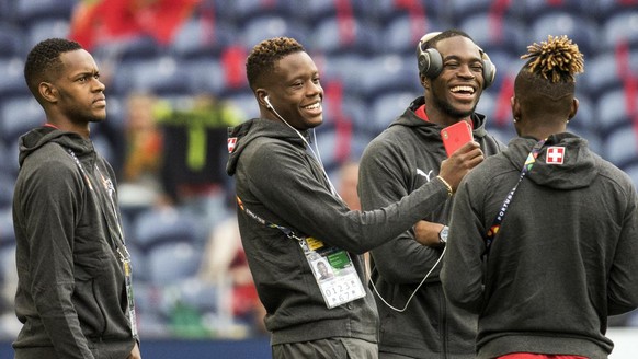 Switzerland&#039;s midfielder Edimilson Fernandes, Switzerland&#039;s midfielder Denis Zakaria, Switzerland&#039;s goalkeeper Yvon Mvogo and Switzerland&#039;s defender Francois Moubandje, from left,  ...