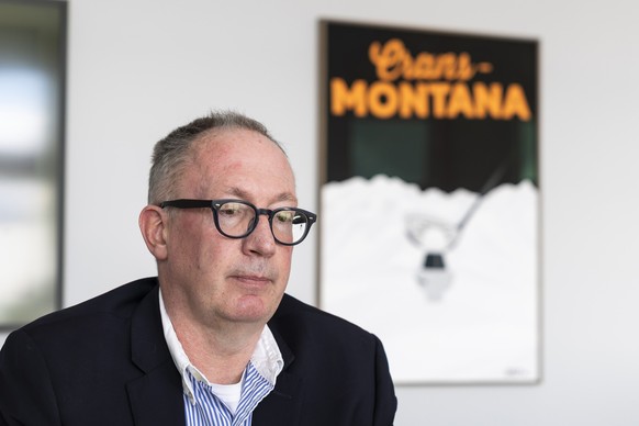 Nicolas Feraud, Mayor of Crans-Montana, speaks to a journalist during an interview, in Crans-Montana, Switzerland, Monday, January 26, 2026. 40 people mostly teenagers lost their lives and 116 were se ...