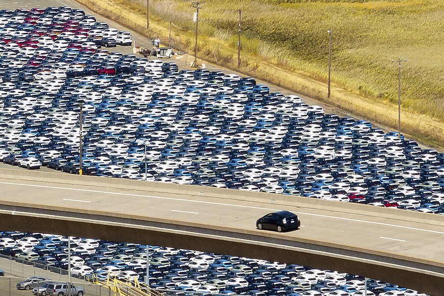 KEYPIX - New cars line a lot at the Port of Benicia in Benicia, Calif., on Friday, Aug. 8, 2025. (AP Photo/Noah Berger)