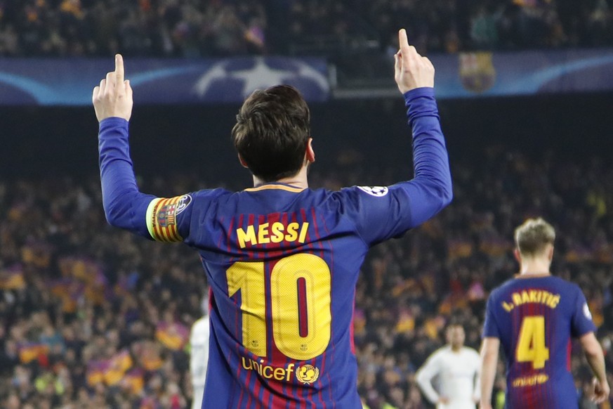 Barcelona&#039;s Lionel Messi celebrates after scoring his side&#039;s third goal during the Champions League round of sixteen second leg soccer match between FC Barcelona and Chelsea at the Camp Nou  ...