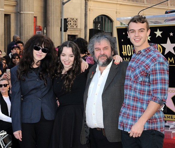 HOLLYWOOD, CA - DECEMBER 08: Director Sir Peter Jackson with family Fran Walsh, Katie and Billy at The Hollywood Walk Of Fame Ceremony for Sir Peter Jackson held on December 8, 2014 in Hollywood, Cali ...