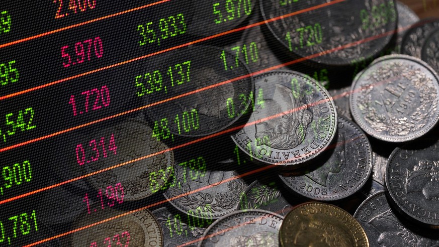 Swiss franc coins and stock market indicators (money, economy, finance, business, inflation, crisis)