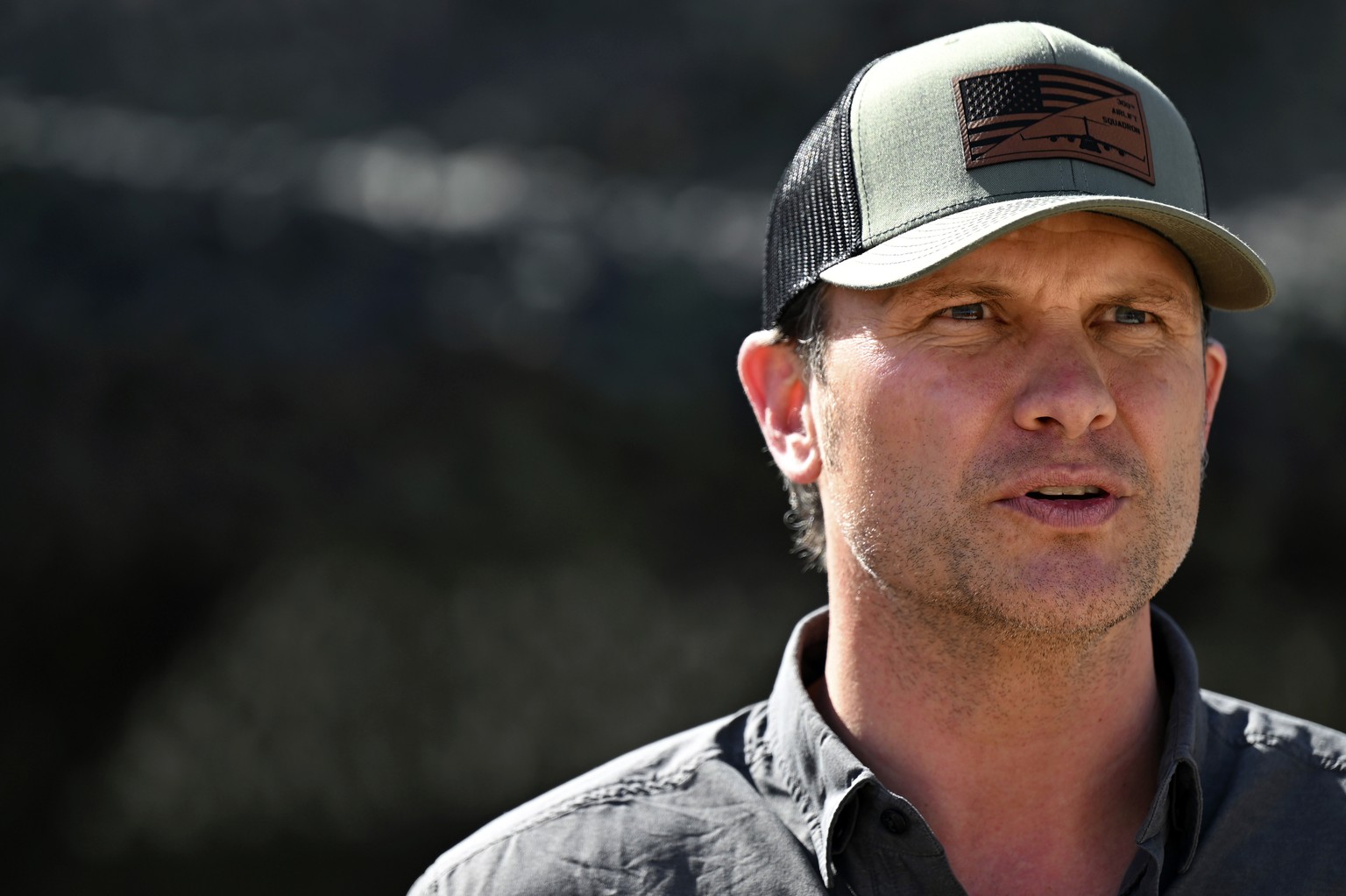 Defense Secretary Pete Hegseth listens Vice President JD Vance speaks to reporters during a visit to the U.S. border with Mexico Wednesday, March 5, 2025 in Eagle Pass, Texas. (Brandon Bell/Pool via A ...