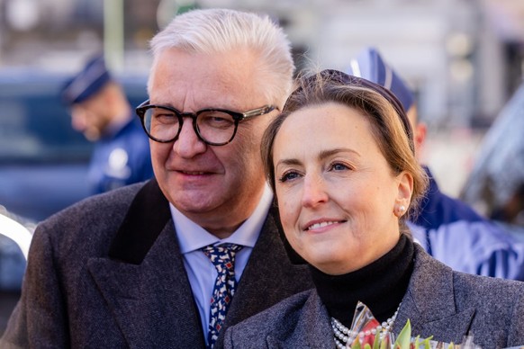 LAEKEN, BELGIUM - FEBRUARY 18: Prince Laurent and Princess Claire of Belgium attend the annual mass in memory of deceased members of the royal family at Eglise Notre-Dame de Laeken on February 18, 202 ...