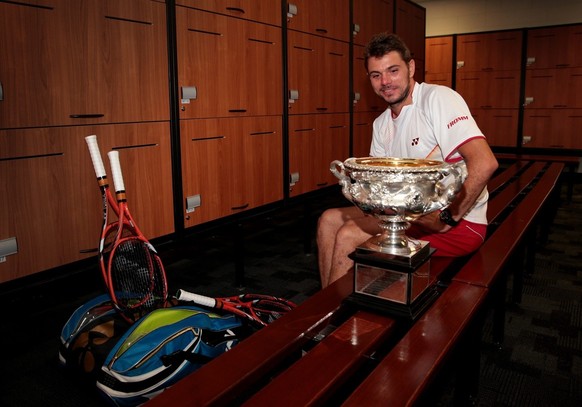 epa04042758 Stanislas Wawrinka of Switzerland poses for photos in the locker room after winning the men&#039;s singles match at the Australian Open tennis tournament in Melbourne, Australia, 27 Januar ...