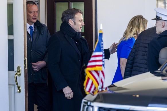 epa11921767 French President Emmanuel Macron departs following a G7 Leadership Summit call with US President Donald J. Trump at the White House in Washington, DC, USA, 24 February 2025. EPA/SHAWN THEW