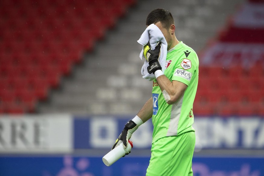 Sion&#039;s goalkeeper Kevin Fickentscher reacts after losing against Servette, during the Super League soccer match of Swiss Championship between FC Sion and FC Servette, at the Stade de Tourbillon s ...