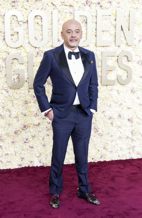 epa11063177 French designer Christian Louboutin arrives for the 81st annual Golden Globe Awards ceremony at the Beverly Hilton Hotel in Beverly Hills, California, USA, 07 January 2024. Artists in vari ...