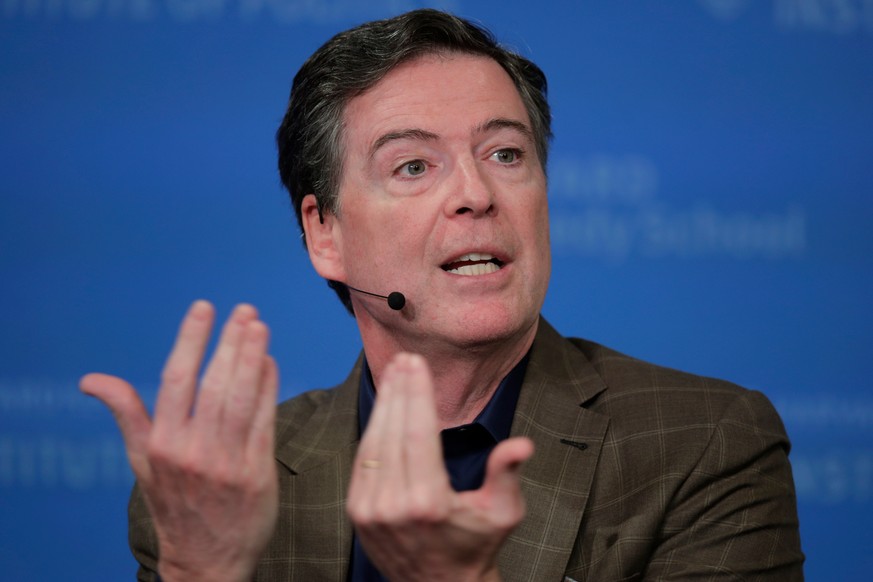 FILE - Former Director of the Federal Bureau of Investigation James Comey at Harvard University's Institute of Politics' JFK Jr. Forum in Cambridge, Mass., Feb. 24, 2020. (AP Photo/Charles K ...