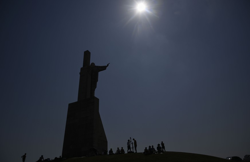 epa13163614 People wait on the top of mount Naranco in order to save a spot to watch the solar eclipse later in the day in Oviedo, Asturias, Spain, 12 August 2026. Total solar eclipse takes place acro ...