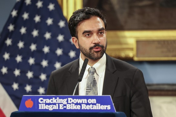 epa13152360 New York City Mayor Zohran Mamdani (C) speaks during a news conference at City Hall in New York, New York, USA, 05 August 2026. Mamdani announced that his administration had issued cease-a ...