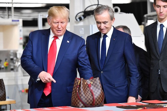 President Donald Trump and Bernard Arnault (Photo by Michael Buckner/WWD/Penske Media via Getty Images)