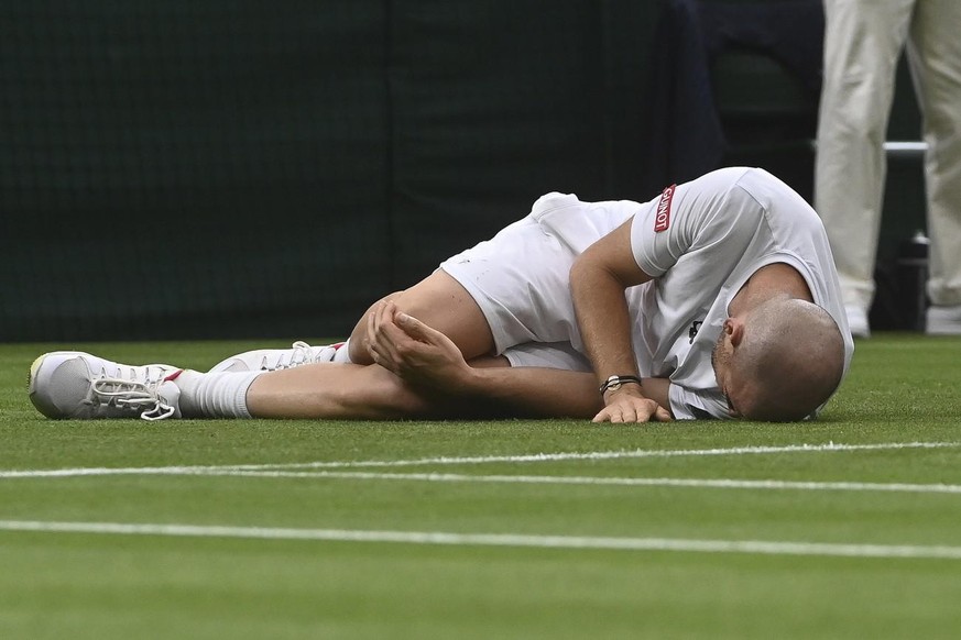 epa09311577 Adrian Mannarino of France reacts during his first round match against Roger Federer of Switzerland at the Wimbledon Championships tennis tournament in Wimbledon, Britain, 29 June 2021. EP ...