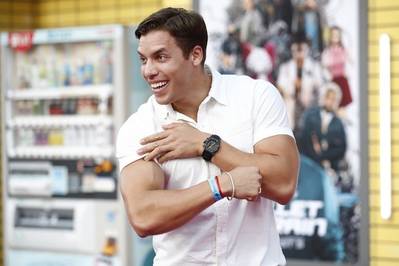 epa10102409 Joseph Baena, Arnold Schwarzenegger' son, attends the premiere of the movie 'Bullet Train' at the Regency Village Theater in Los Angeles, California, USA, 01 August 2022. Th ...