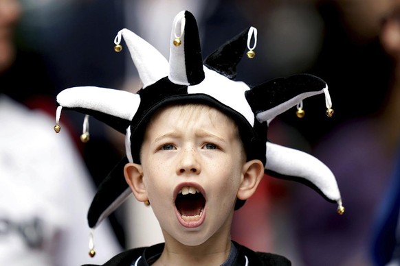 A young Derby County fan in the stands shows his support prior to the English Championship Play-off final soccer match between Derby and Aston Villa, at Wembley Stadium, London, Monday May 27, 2019. A ...