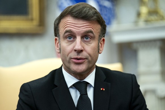 epa11922231 French President Emmanuel Macron speaks during a meeting with US President Donald Trump (not pictured) in the Oval Office of the White House in Washington, DC, USA, 24 February 2025. EPA/B ...