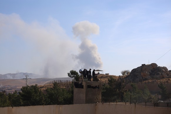 epa11766697 Smoke billows following an Israeli airstrike near Sednaya prison, near Damascus, Syria, 09 December 2024. The Political Affairs Department of the Syrian Salvation Government said 30,000 pr ...