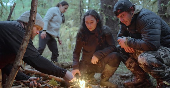 Outlast. (L to R) Nick Radner, Angie Esparza and Seth Lueker in Episode 1 of Outlast. Cr. Courtesy of Netflix © 2023