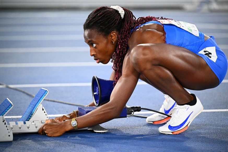 ROME, ITALY - JUNE 11: Ayomide Folorunso of Team Italy adjusts her starting blocks prior to the Women&#039;s 400m Hurdles Final on day five of the 26th European Athletics Championships - Rome 2024 at  ...