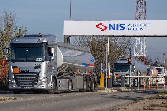 A tanker truck rides behind an inscription which reads as &quot;NIS - The Future in Action&quot; as leaving the grounds of the Petroleum Industry of Serbia (NIS), Serbiaís only oil refinery, which has ...