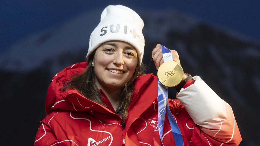 Gold medallist Mathilde Gremaud of Switzerland poses with her medal after the Freestyle Skiing Freeski slopestyle final at the 2026 Olympic Winter Games in Livigno, Italy, on Monday, February 9, 2026. ...