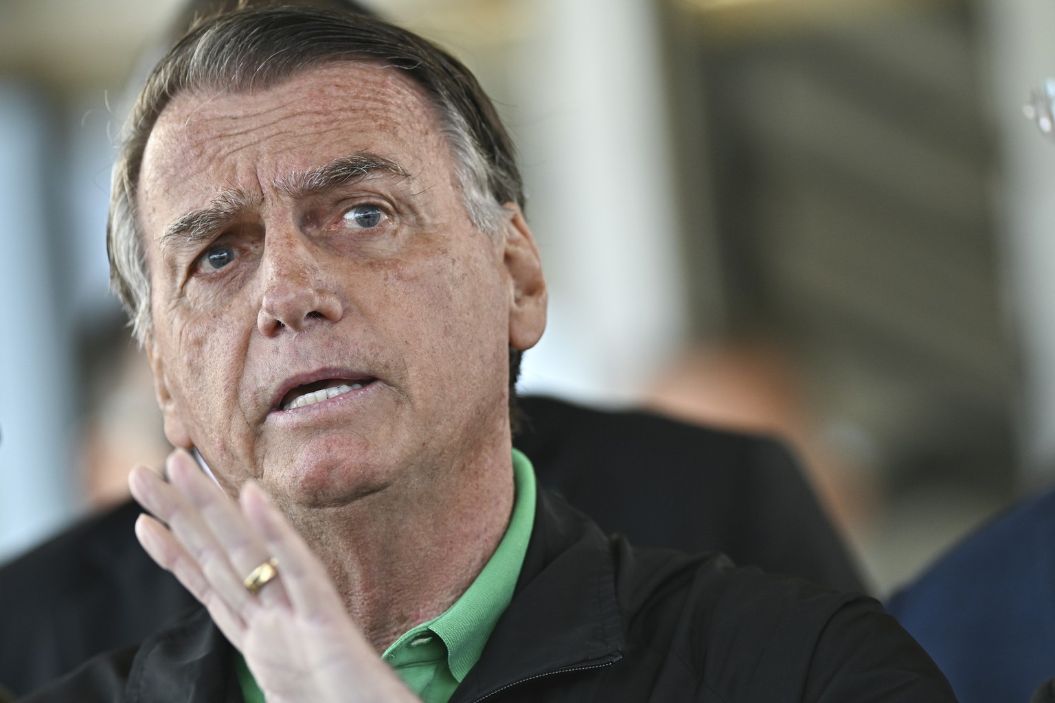 epa12243404 Former Brazilian president Jair Bolsonaro speaks during a press conference in front of the Federal Senate in Brasilia, Brazil, 17 July 2025. Bolsonaro stated that he will &#039;face the tr ...