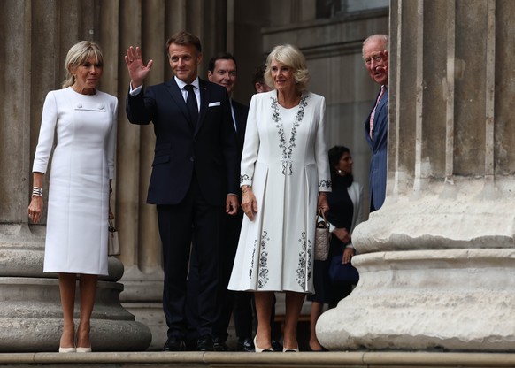 epa13207307 (L-R) France's First Lady Brigitte Macron, France's President Emmanuel Macron, Britain's Queen Camilla and Britain's King Charles III arrive for for an event at the Bri ...