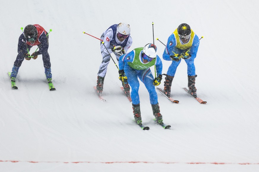 From left: Satoshi Furuno of Japan, Alex Fiva of Switzerland, Simone Deromedis of Italy and Federico Tomasoni of Italy reach for the finish line during the men's Freestyle Skiing Ski Cross Big Fi ...