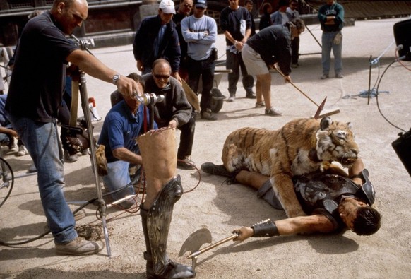 Gladiator (2000) - Filming the Tigris of Gaul fight scene. According to VFX supervisor Neil Corbould, the tiger dummy had only basic animatronics. “It was literally thrown at Russell and he would grab ...